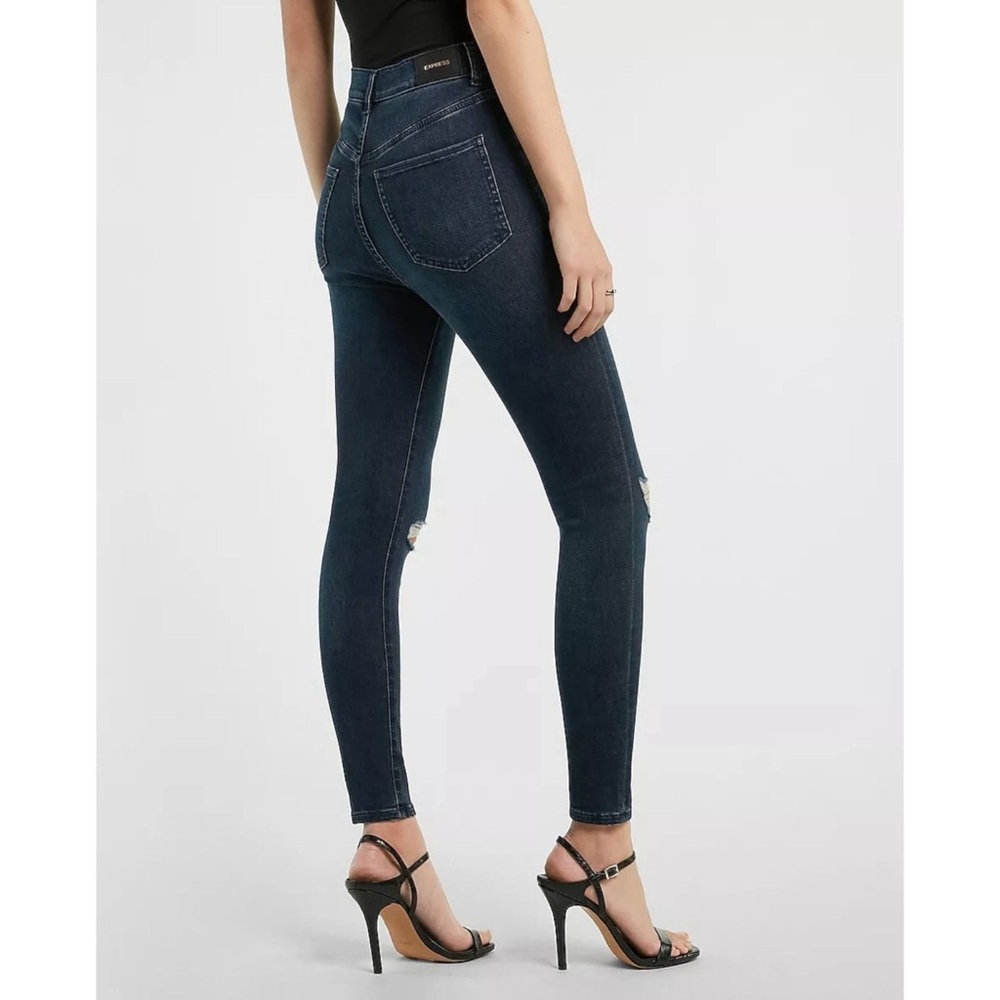 EXPRESS SUPER HIGH RISE DARK WASH RIPPED SUPERSOFT SKINNY JEANS - Picture 2 of 6